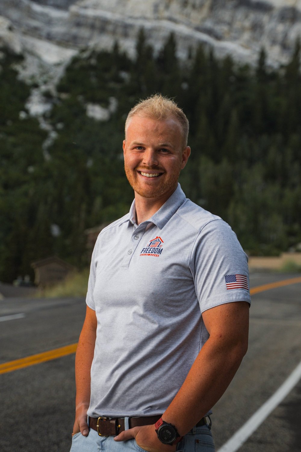 Owner of Freedom Garage Doors in a company polo